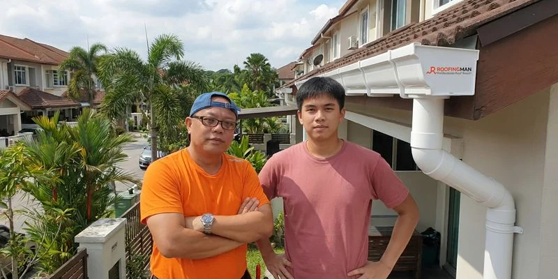 New UPVC gutter system installed on modern Malaysian terrace house with clean white finish
